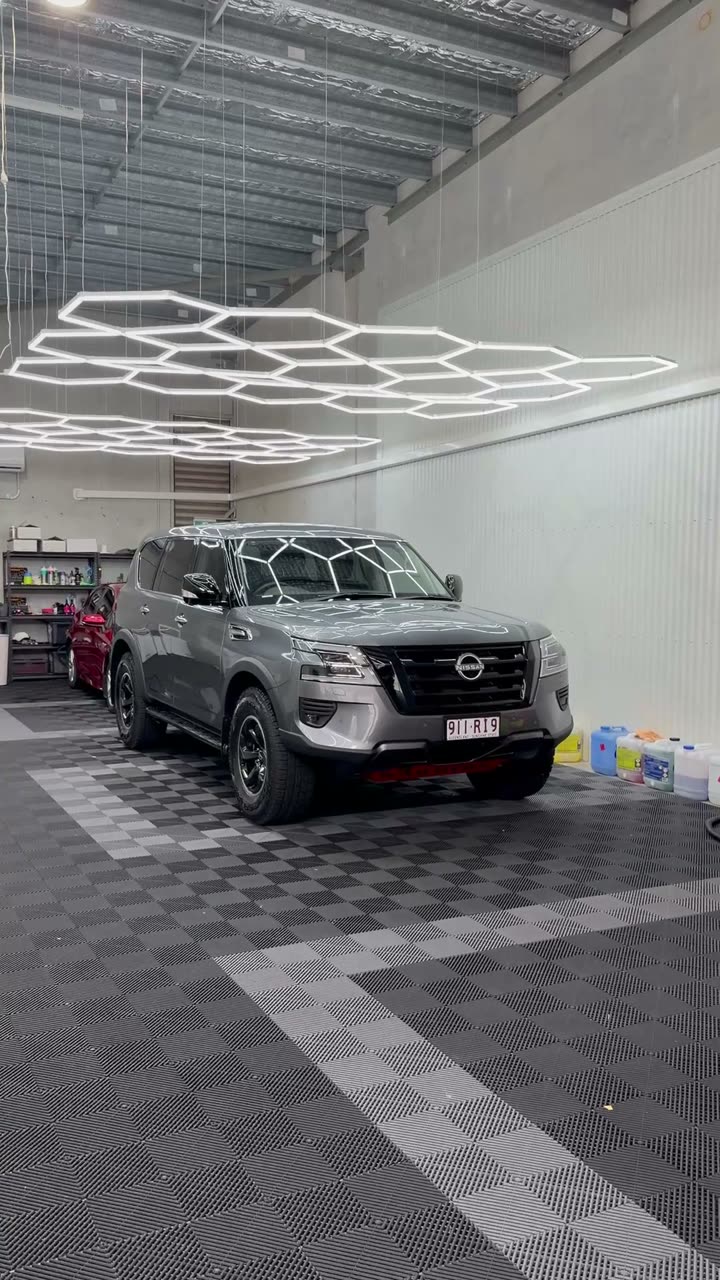 Grey Nissan Patrol Warrior in the shop